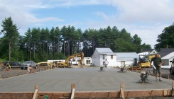 Power troweling a concrete slab Power troweling a concrete slab