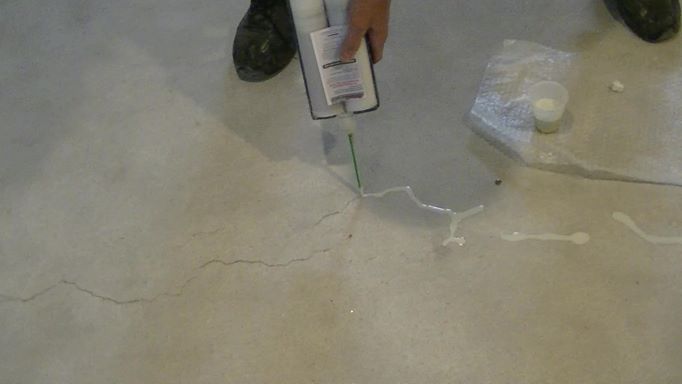 Repairing basement floor cracks