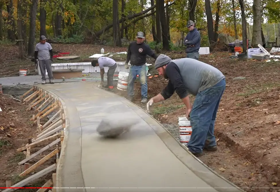 How to use color hardener to color concrete broadcasting color hardener by hand