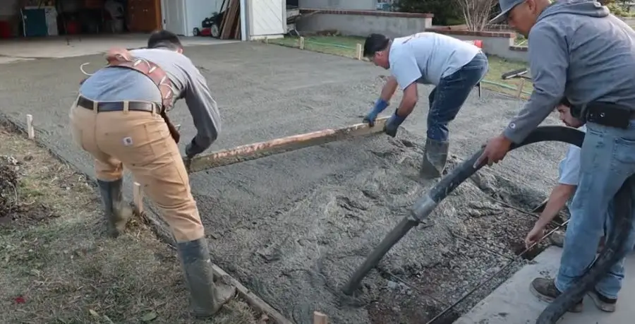 how thick should a concrete driveway be