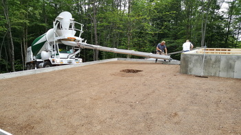 Front discharge concrete truck