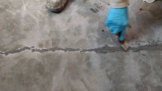 How to fix cracks in a concrete floor