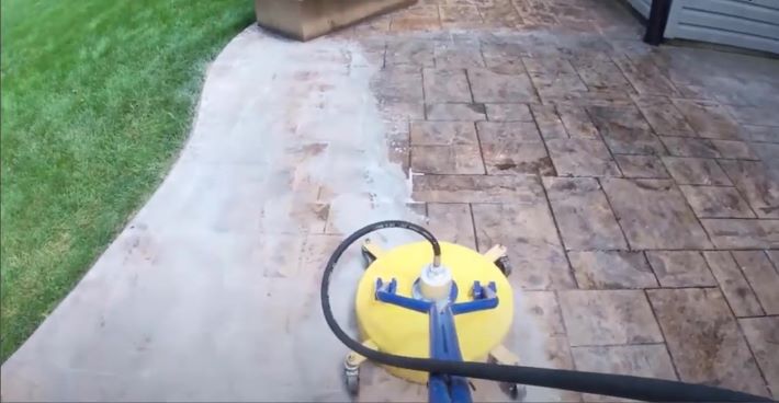 Power washing to remove concrete sealer
