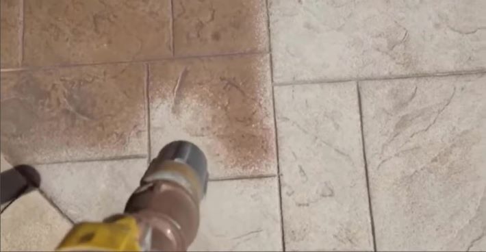 Soda blasting to remove concrete sealer