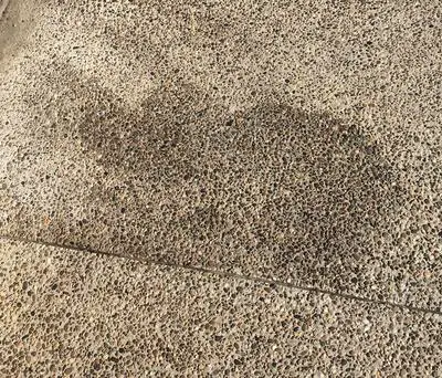 blotchy sealer patio slab 2